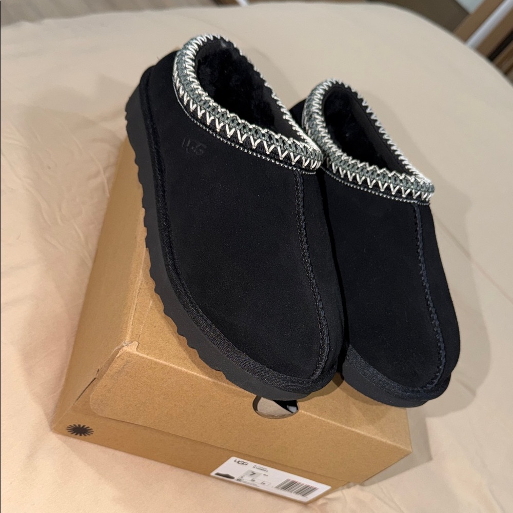 UGG Black Suede Slip-Ons with Woven Trim